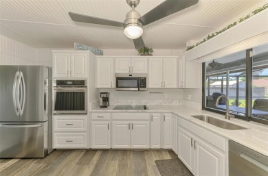 MUST SEE!  SPLIT BEDROOM PLAN!  DOUBLE LOT!  UPDATED!  HEATED on Oyster Creek Golf Club in Florida - for sale on GolfHomes.com, golf home, golf lot