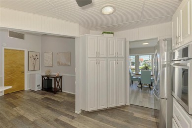 MUST SEE!  SPLIT BEDROOM PLAN!  DOUBLE LOT!  UPDATED!  HEATED on Oyster Creek Golf Club in Florida - for sale on GolfHomes.com, golf home, golf lot