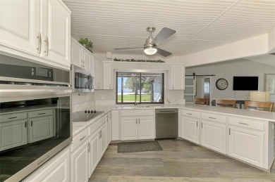 MUST SEE!  SPLIT BEDROOM PLAN!  DOUBLE LOT!  UPDATED!  HEATED on Oyster Creek Golf Club in Florida - for sale on GolfHomes.com, golf home, golf lot