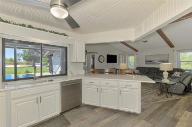 MUST SEE!  SPLIT BEDROOM PLAN!  DOUBLE LOT!  UPDATED!  HEATED on Oyster Creek Golf Club in Florida - for sale on GolfHomes.com, golf home, golf lot