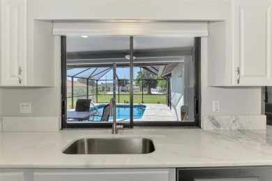 MUST SEE!  SPLIT BEDROOM PLAN!  DOUBLE LOT!  UPDATED!  HEATED on Oyster Creek Golf Club in Florida - for sale on GolfHomes.com, golf home, golf lot