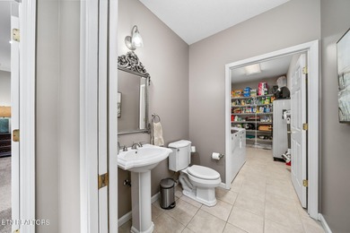 Located in Fairfield Glade, this exceptional all-brick custom on Heatherhurst Golf Course in Tennessee - for sale on GolfHomes.com, golf home, golf lot