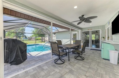 MUST SEE!  SPLIT BEDROOM PLAN!  DOUBLE LOT!  UPDATED!  HEATED on Oyster Creek Golf Club in Florida - for sale on GolfHomes.com, golf home, golf lot