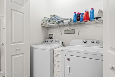 Ask agent for details. Live your coastal dream in this on Sandpiper Bay Golf and Country Club in North Carolina - for sale on GolfHomes.com, golf home, golf lot