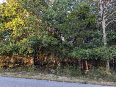 Ready to build your dream home? Nestled in a gently wooded area on Holiday Island Executive Golf Course in Arkansas - for sale on GolfHomes.com, golf home, golf lot