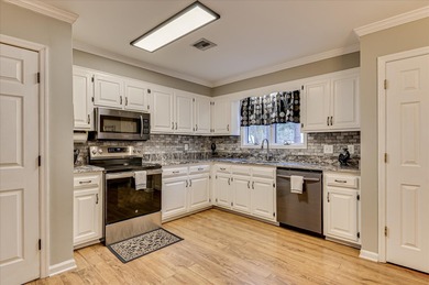 Welcome to a villa that feels less like a ''unit'' and more like on Houndslake Country Club in South Carolina - for sale on GolfHomes.com, golf home, golf lot