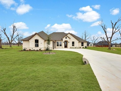 Welcome to this exceptional new build in the coveted, guarded on Pecan Plantation Country Club in Texas - for sale on GolfHomes.com, golf home, golf lot