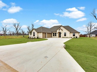 Welcome to this exceptional new build in the coveted, guarded on Pecan Plantation Country Club in Texas - for sale on GolfHomes.com, golf home, golf lot