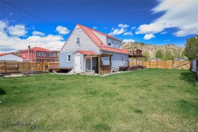 Discover this spacious 5-bedroom, 3-bathroom home nestled in the on The Old Works Golf Course in Montana - for sale on GolfHomes.com, golf home, golf lot