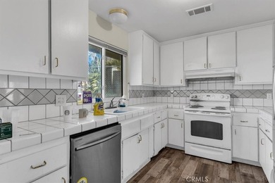 Welcome to this inviting single-story home ideally located in on Green Tree Golf Course in California - for sale on GolfHomes.com, golf home, golf lot