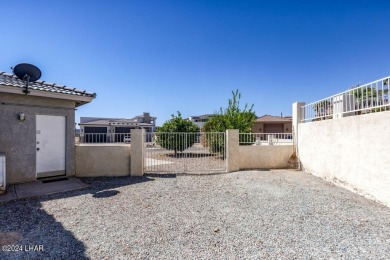 Located in the prestigious Residential Estates, this stunning on London Bridge Golf Course in Arizona - for sale on GolfHomes.com, golf home, golf lot