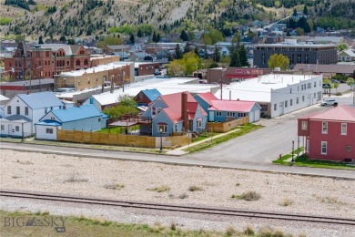 Discover this spacious 5-bedroom, 3-bathroom home nestled in the on The Old Works Golf Course in Montana - for sale on GolfHomes.com, golf home, golf lot