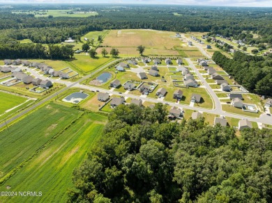 Nearly 3,000 square feet nestled next to Ayden Golf and Country on Ayden Golf and Country Club in North Carolina - for sale on GolfHomes.com, golf home, golf lot