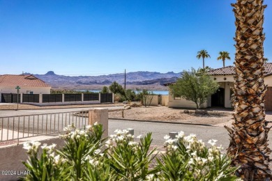 Located in the prestigious Residential Estates, this stunning on London Bridge Golf Course in Arizona - for sale on GolfHomes.com, golf home, golf lot