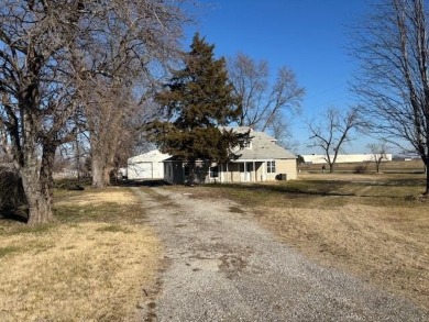 Seller has never lived in the house and it will be sold as is on Ottawa Country Club in Kansas - for sale on GolfHomes.com, golf home, golf lot