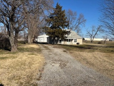 Seller has never lived in the house and it will be sold as is on Ottawa Country Club in Kansas - for sale on GolfHomes.com, golf home, golf lot