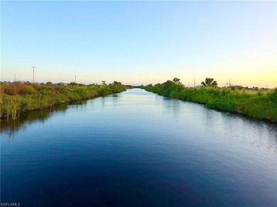 Highly desirable waterfront southern exposure .30 acre level lot on Burnt Store Golf Club in Florida - for sale on GolfHomes.com, golf home, golf lot