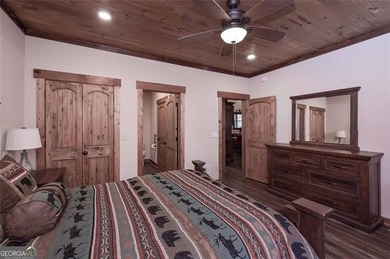 Nestled in the serene beauty of the North Georgia mountains on White Path Golf Club in Georgia - for sale on GolfHomes.com, golf home, golf lot