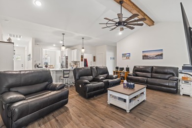 This move-in-ready home features luxury vinyl plank flooring on Shaftesbury Glen Golf and Fish Club in South Carolina - for sale on GolfHomes.com, golf home, golf lot