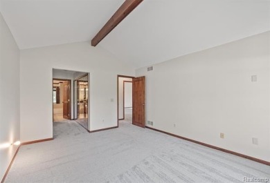 Welcome to 4868 Pine Eagles Court! This beautifully maintained on Oak Pointe Country Club in Michigan - for sale on GolfHomes.com, golf home, golf lot