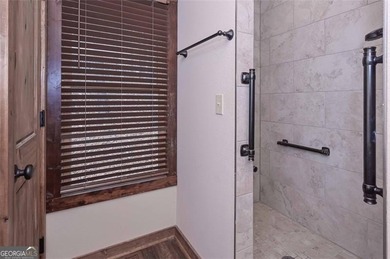 Nestled in the serene beauty of the North Georgia mountains on White Path Golf Club in Georgia - for sale on GolfHomes.com, golf home, golf lot