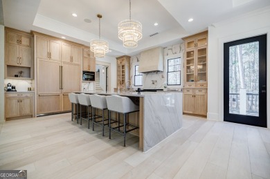 This meticulous custom golf residence is impeccably built with on Reynolds Lake Oconee - The Oconee in Georgia - for sale on GolfHomes.com, golf home, golf lot