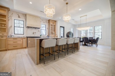 This meticulous custom golf residence is impeccably built with on Reynolds Lake Oconee - The Oconee in Georgia - for sale on GolfHomes.com, golf home, golf lot