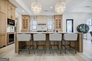 This meticulous custom golf residence is impeccably built with on Reynolds Lake Oconee - The Oconee in Georgia - for sale on GolfHomes.com, golf home, golf lot