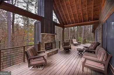 Nestled in the serene beauty of the North Georgia mountains on White Path Golf Club in Georgia - for sale on GolfHomes.com, golf home, golf lot