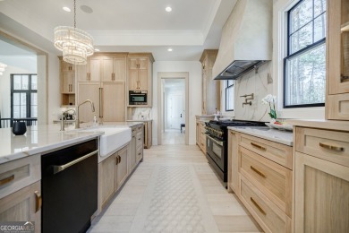 This meticulous custom golf residence is impeccably built with on Reynolds Lake Oconee - The Oconee in Georgia - for sale on GolfHomes.com, golf home, golf lot