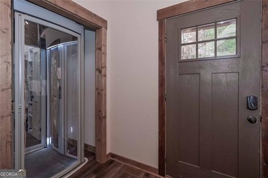 Nestled in the serene beauty of the North Georgia mountains on White Path Golf Club in Georgia - for sale on GolfHomes.com, golf home, golf lot