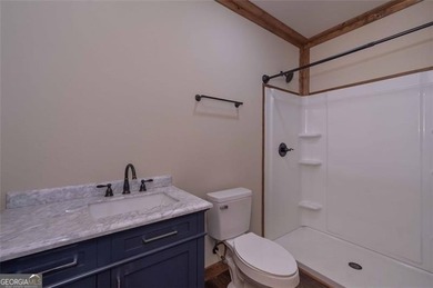 Nestled in the serene beauty of the North Georgia mountains on White Path Golf Club in Georgia - for sale on GolfHomes.com, golf home, golf lot