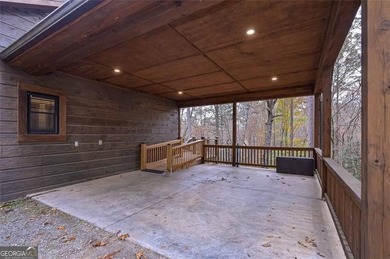 Nestled in the serene beauty of the North Georgia mountains on White Path Golf Club in Georgia - for sale on GolfHomes.com, golf home, golf lot