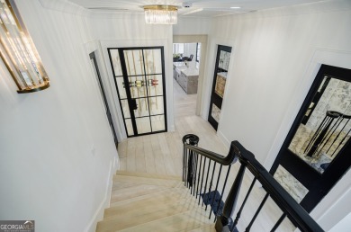 This meticulous custom golf residence is impeccably built with on Reynolds Lake Oconee - The Oconee in Georgia - for sale on GolfHomes.com, golf home, golf lot