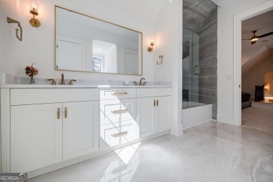 This meticulous custom golf residence is impeccably built with on Reynolds Lake Oconee - The Oconee in Georgia - for sale on GolfHomes.com, golf home, golf lot