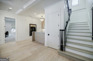 This meticulous custom golf residence is impeccably built with on Reynolds Lake Oconee - The Oconee in Georgia - for sale on GolfHomes.com, golf home, golf lot