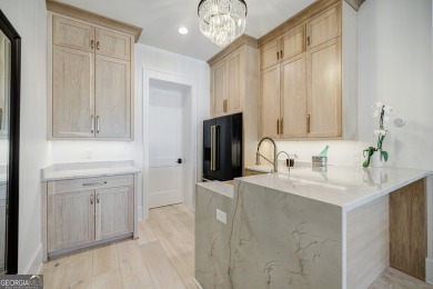 This meticulous custom golf residence is impeccably built with on Reynolds Lake Oconee - The Oconee in Georgia - for sale on GolfHomes.com, golf home, golf lot