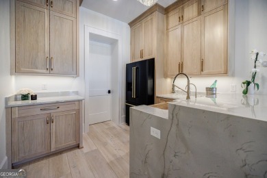 This meticulous custom golf residence is impeccably built with on Reynolds Lake Oconee - The Oconee in Georgia - for sale on GolfHomes.com, golf home, golf lot