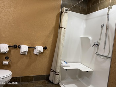 Welcome to an exceptional investment and vacation opportunity at on Sevierville Golf Club in Tennessee - for sale on GolfHomes.com, golf home, golf lot