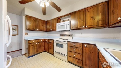 A true charmer in Country Club Estates, this home has been on The Olde Course At Loveland in Colorado - for sale on GolfHomes.com, golf home, golf lot