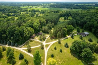 123+ Acres with a Lake, 2 Pole Barns, a Club House & a 2 on Arcadia Hills Golf Course in Michigan - for sale on GolfHomes.com, golf home, golf lot