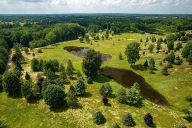 123+ Acres with a Lake, 2 Pole Barns, a Club House & a 2 on Arcadia Hills Golf Course in Michigan - for sale on GolfHomes.com, golf home, golf lot