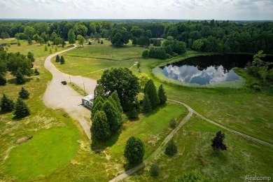 123+ Acres with a Lake, 2 Pole Barns, a Club House & a 2 on Arcadia Hills Golf Course in Michigan - for sale on GolfHomes.com, golf home, golf lot