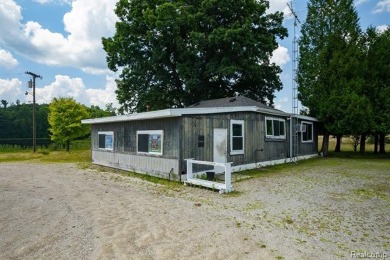 123+ Acres with a Lake, 2 Pole Barns, a Club House & a 2 on Arcadia Hills Golf Course in Michigan - for sale on GolfHomes.com, golf home, golf lot