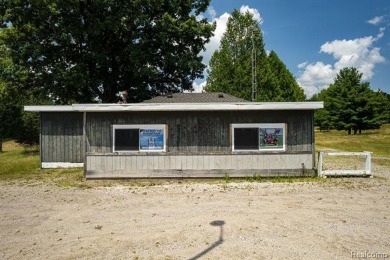 123+ Acres with a Lake, 2 Pole Barns, a Club House & a 2 on Arcadia Hills Golf Course in Michigan - for sale on GolfHomes.com, golf home, golf lot