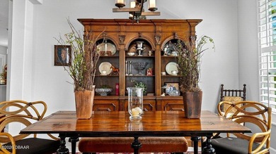 Perfectly positioned on the 12th tee of the south golf course in on Plantation Bay Golf and Country Club in Florida - for sale on GolfHomes.com, golf home, golf lot