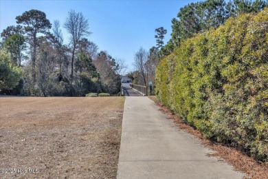 Experience coastal living in this meticulously maintained on South Harbour Golf Links in North Carolina - for sale on GolfHomes.com, golf home, golf lot