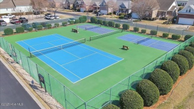 Experience coastal living in this meticulously maintained on South Harbour Golf Links in North Carolina - for sale on GolfHomes.com, golf home, golf lot