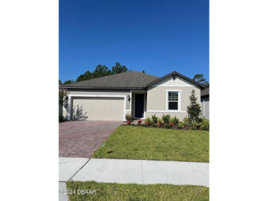 Experience the allure of this gorgeous BRAND NEW home this is on LPGA International Golf Course in Florida - for sale on GolfHomes.com, golf home, golf lot