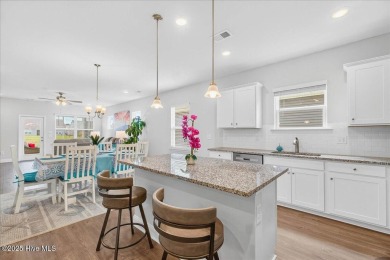 Discover exceptional living at 195 Hawks Run Drive in Eagle Run on Crow Creek Golf Club in North Carolina - for sale on GolfHomes.com, golf home, golf lot